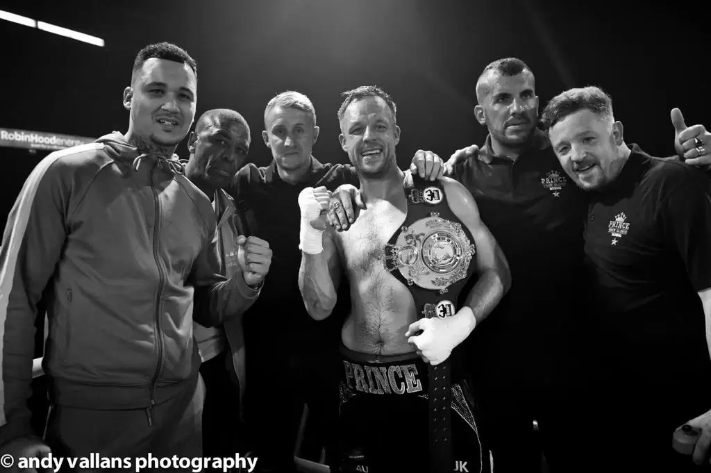 vince 'prince' glover boxer with his team at a prince promotions boxing match