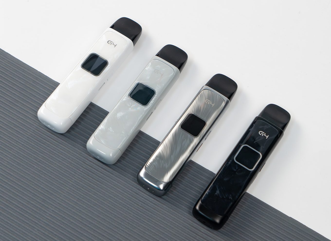 uwell caliburn g4 vape devices in white, grey, silver and black