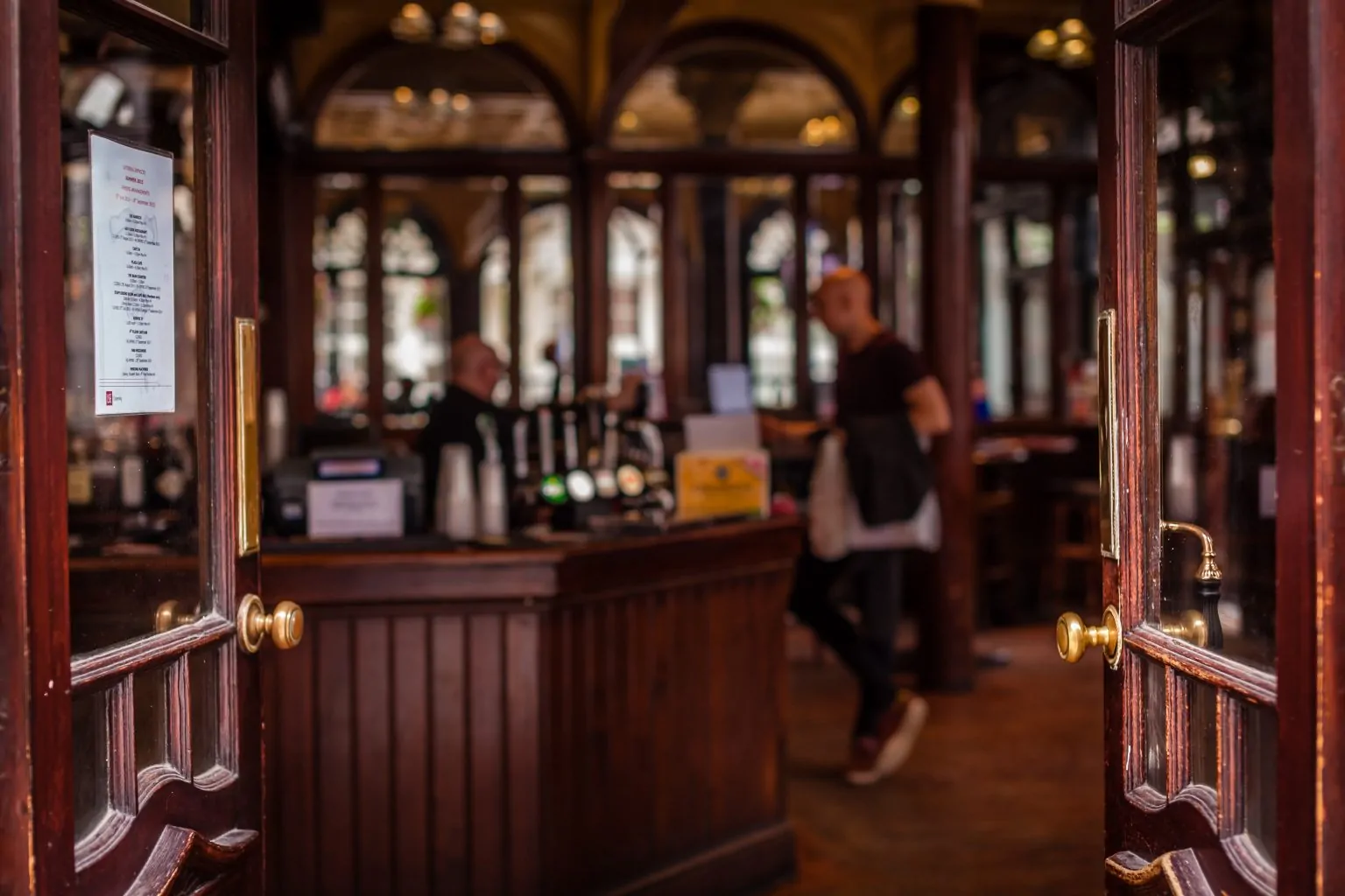 open entrance to the traditional English pub in London, UK