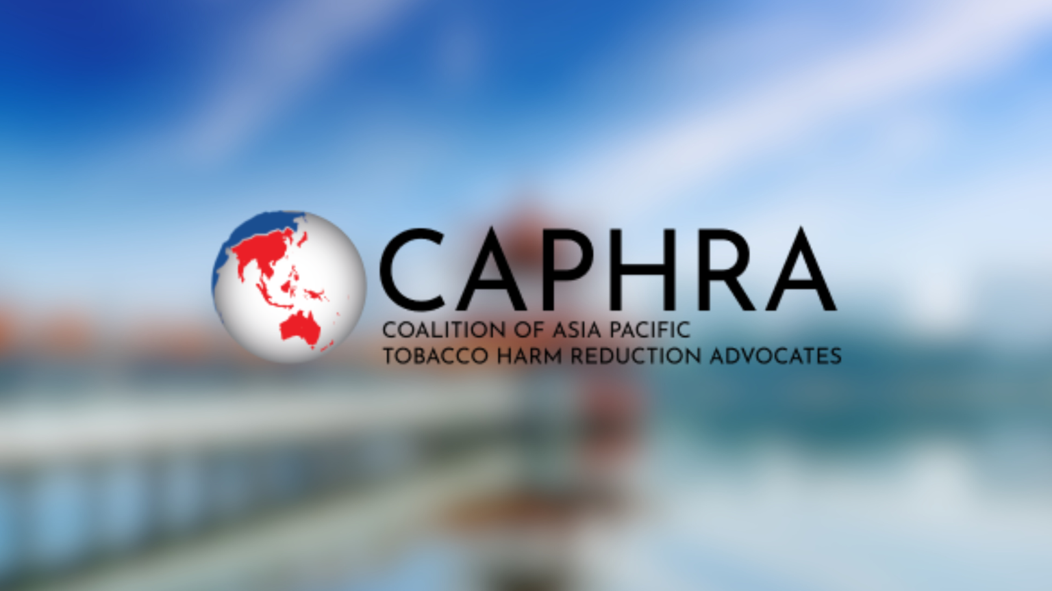 caphra black logo on blurred landscape
